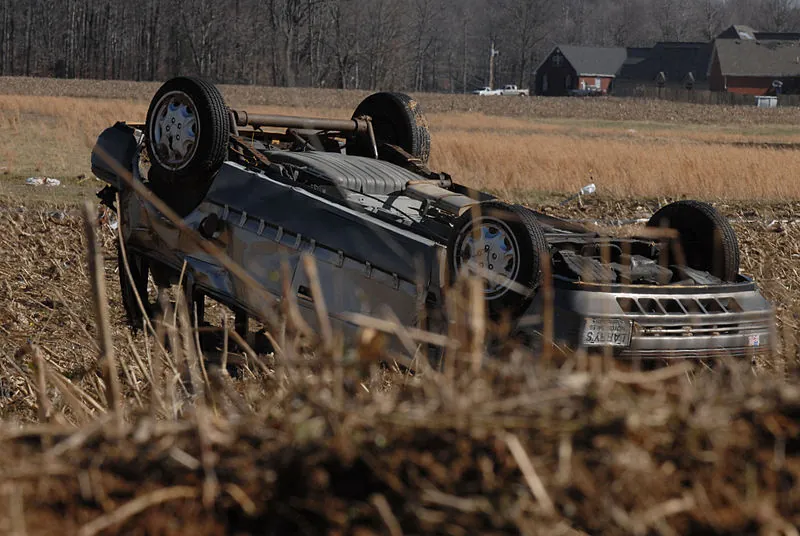 800px-FEMA_-_34115_-_Overturned_car_in_a_field_in_Tennessee